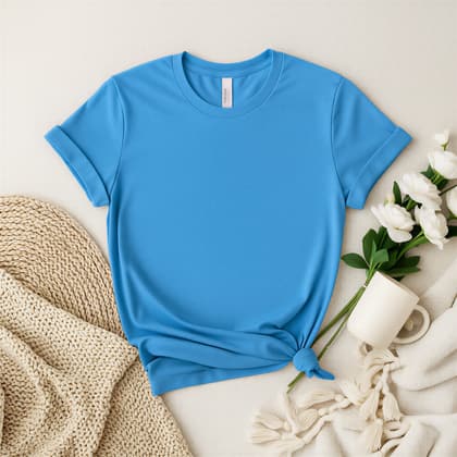 Bella+Canvas 3001 — Flat Lay mockup in Carolina Blue