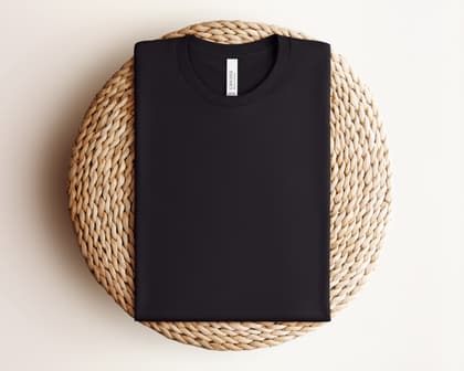 Bella+Canvas 3001 — Folded on Rattan mockup in Black