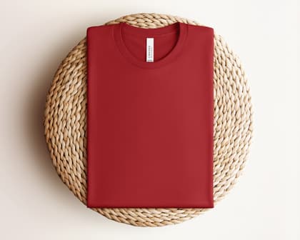 Bella+Canvas 3001 — Folded on Rattan mockup in Canvas Red
