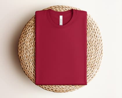 Bella+Canvas 3001 — Folded on Rattan mockup in Cardinal