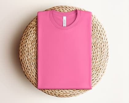 Bella+Canvas 3001 — Folded on Rattan mockup in Charity Pink
