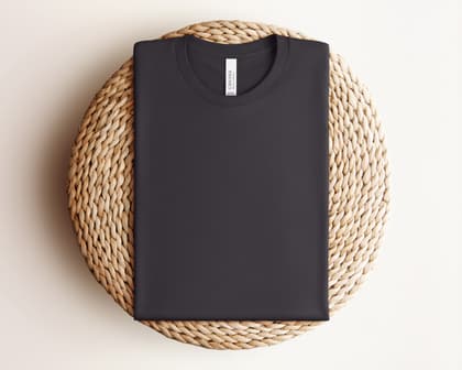 Bella+Canvas 3001 — Folded on Rattan mockup in Dark Grey
