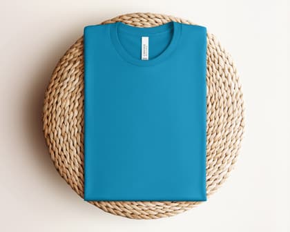 Bella+Canvas 3001 — Folded on Rattan mockup in Electric Blue