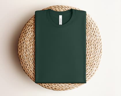 Bella+Canvas 3001 — Folded on Rattan mockup in Forest