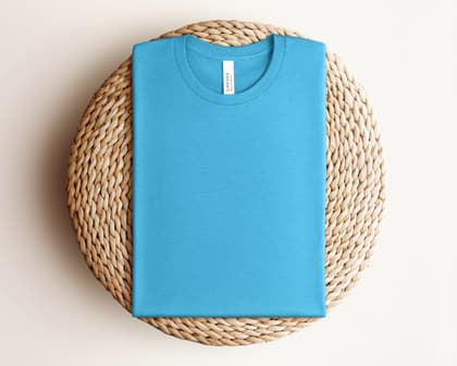 Bella+Canvas 3001 — Folded on Rattan mockup in Heather Aqua