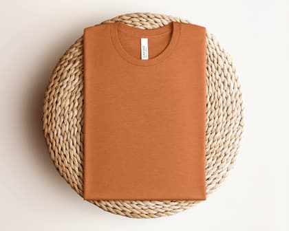 Bella+Canvas 3001 — Folded on Rattan mockup in Heather Autumn