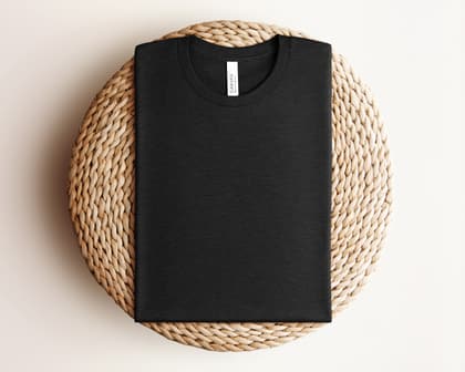 Bella+Canvas 3001 — Folded on Rattan mockup in Heather Black
