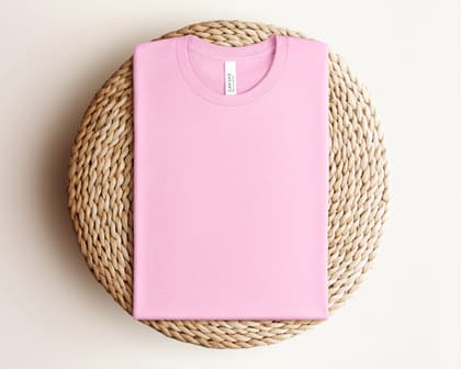 Bella+Canvas 3001 — Folded on Rattan mockup in Heather Bubble Gum