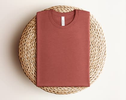 Bella+Canvas 3001 — Folded on Rattan mockup in Heather Clay