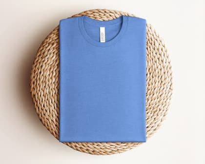 Bella+Canvas 3001 — Folded on Rattan mockup in Heather Columbia Blue