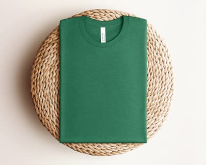 Bella+Canvas 3001 — Folded on Rattan mockup in Heather Grass Green