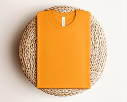 Bella+Canvas 3001 — Folded on Rattan mockup in Heather Marmelade