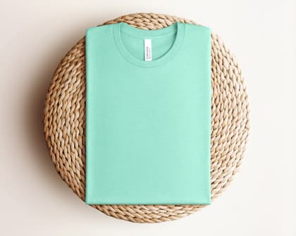Bella+Canvas 3001 — Folded on Rattan mockup in Heather Mint