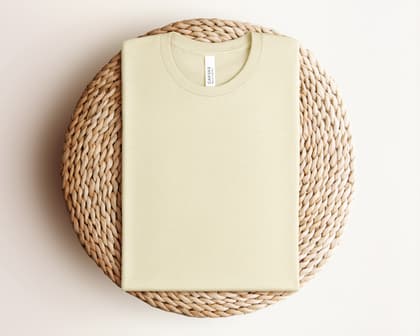 Bella+Canvas 3001 — Folded on Rattan mockup in Heather Natural