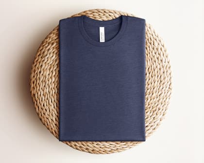 Bella+Canvas 3001 — Folded on Rattan mockup in Heather Navy