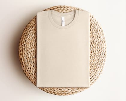 Bella+Canvas 3001 — Folded on Rattan mockup in Heather Oatmeal