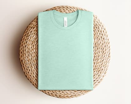 Bella+Canvas 3001 — Folded on Rattan mockup in Heather Prism Mint