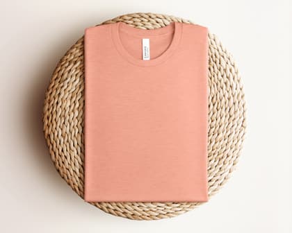 Bella+Canvas 3001 — Folded on Rattan mockup in Heather Prism Sunset