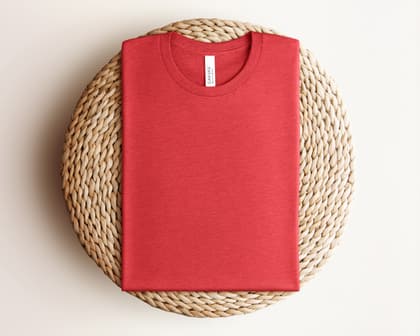 Bella+Canvas 3001 — Folded on Rattan mockup in Heather Red