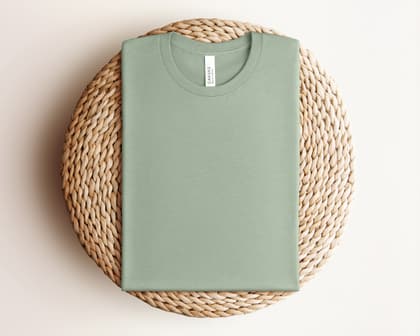 Bella+Canvas 3001 — Folded on Rattan mockup in Heather Sage