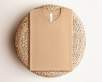 Bella+Canvas 3001 — Folded on Rattan mockup in Heather Sand Dune
