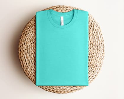 Bella+Canvas 3001 — Folded on Rattan mockup in Heather Sea Green