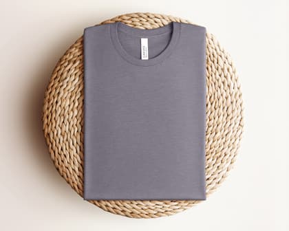 Bella+Canvas 3001 — Folded on Rattan mockup in Heather Storm
