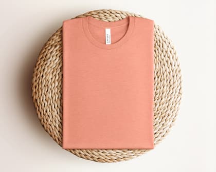 Bella+Canvas 3001 — Folded on Rattan mockup in Heather Sunset
