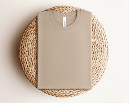 Bella+Canvas 3001 — Folded on Rattan mockup in Heather Tan