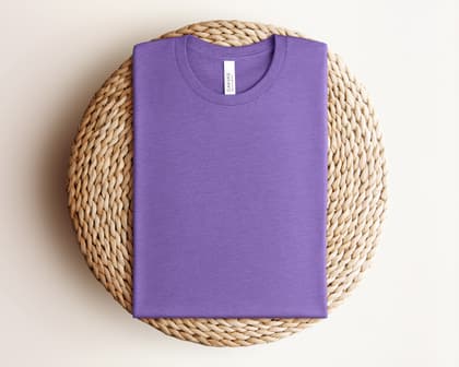 Bella+Canvas 3001 — Folded on Rattan mockup in Heather Team Purple