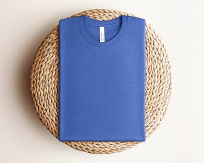 Bella+Canvas 3001 — Folded on Rattan mockup in Heather True Royal