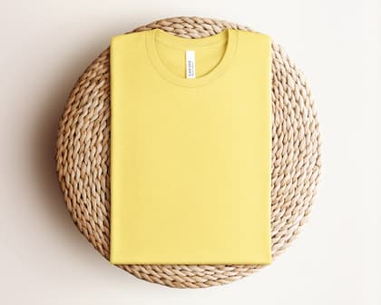 Bella+Canvas 3001 — Folded on Rattan mockup in Heather Yellow