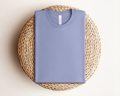 Bella+Canvas 3001 — Folded on Rattan mockup in Lavender Blue