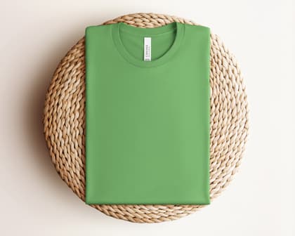 Bella+Canvas 3001 — Folded on Rattan mockup in Leaf