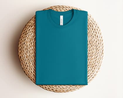 Bella+Canvas 3001 — Folded on Rattan mockup in Marine