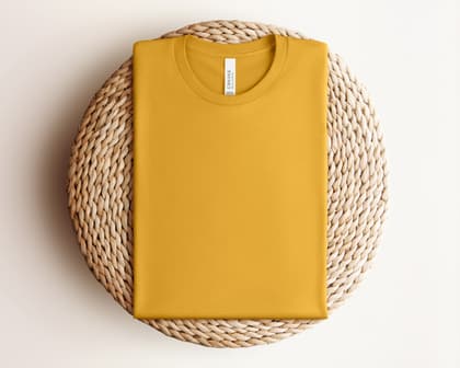 Bella+Canvas 3001 — Folded on Rattan mockup in Mustard