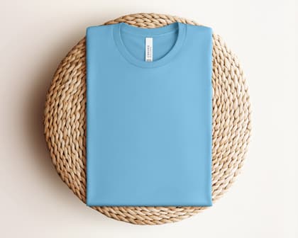 Bella+Canvas 3001 — Folded on Rattan mockup in Ocean Blue