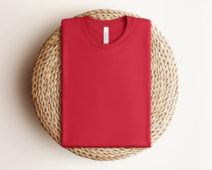 Bella+Canvas 3001 — Folded on Rattan mockup in Red
