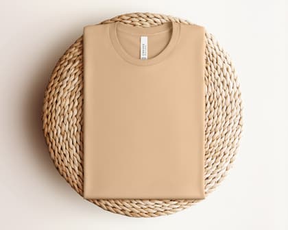 Bella+Canvas 3001 — Folded on Rattan mockup in Sand Dune