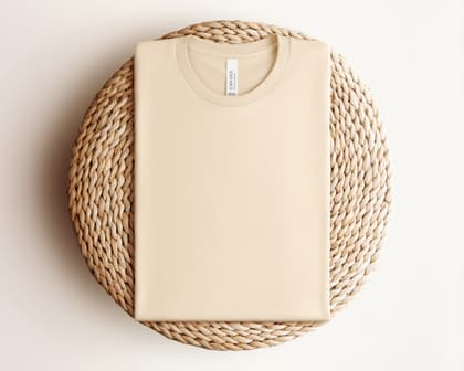 Bella+Canvas 3001 — Folded on Rattan mockup in Soft Cream