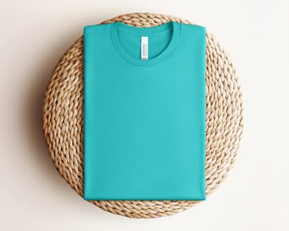 Bella+Canvas 3001 — Folded on Rattan mockup in Teal