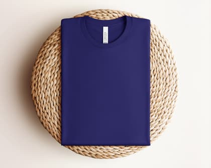 Bella+Canvas 3001 — Folded on Rattan mockup in Team Navy