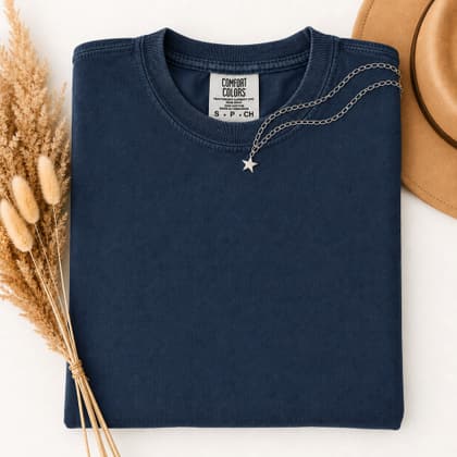 Comfort Colors® 1717 — Folded with Props mockup in True Navy