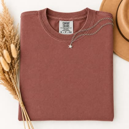 Comfort Colors® 1717 — Folded with Props mockup in Brick