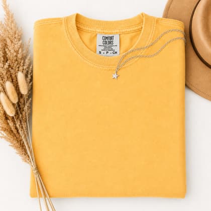 Comfort Colors® 1717 — Folded with Props mockup in Citrus
