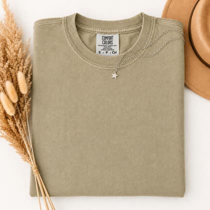 Comfort Colors® 1717 — Folded with Props mockup in Khaki