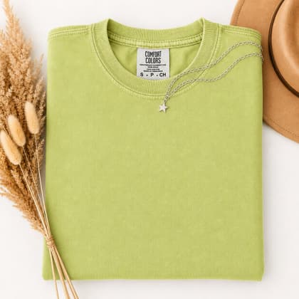 Comfort Colors® 1717 — Folded with Props mockup in Kiwi