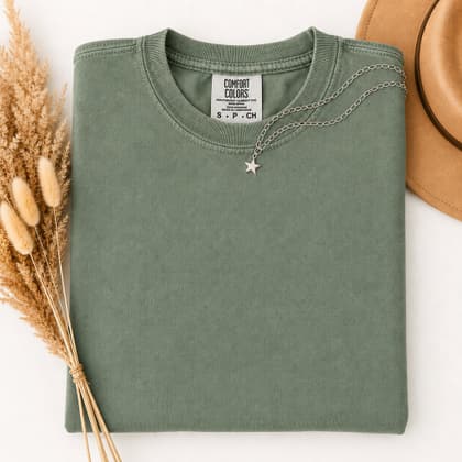 Comfort Colors® 1717 — Folded with Props mockup in Light Green