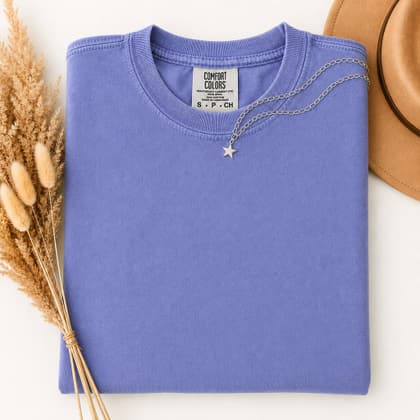 Comfort Colors® 1717 — Folded with Props mockup in Flo Blue