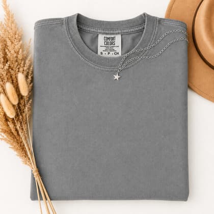 Comfort Colors® 1717 — Folded with Props mockup in Granite